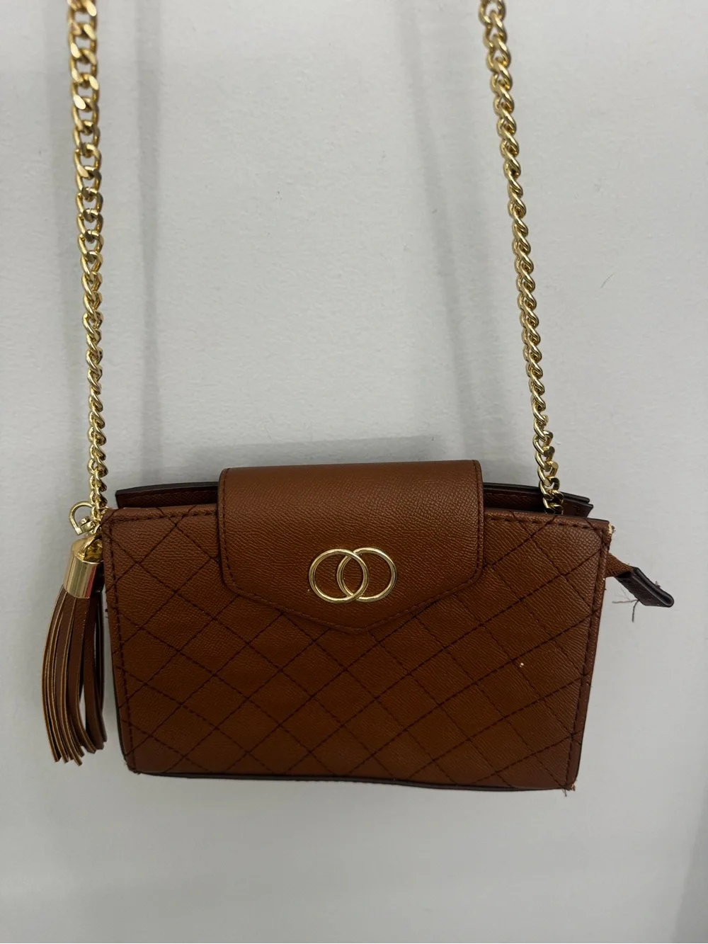 Aldo Brown Quilted Crossbody with Gold Chain and Tassel